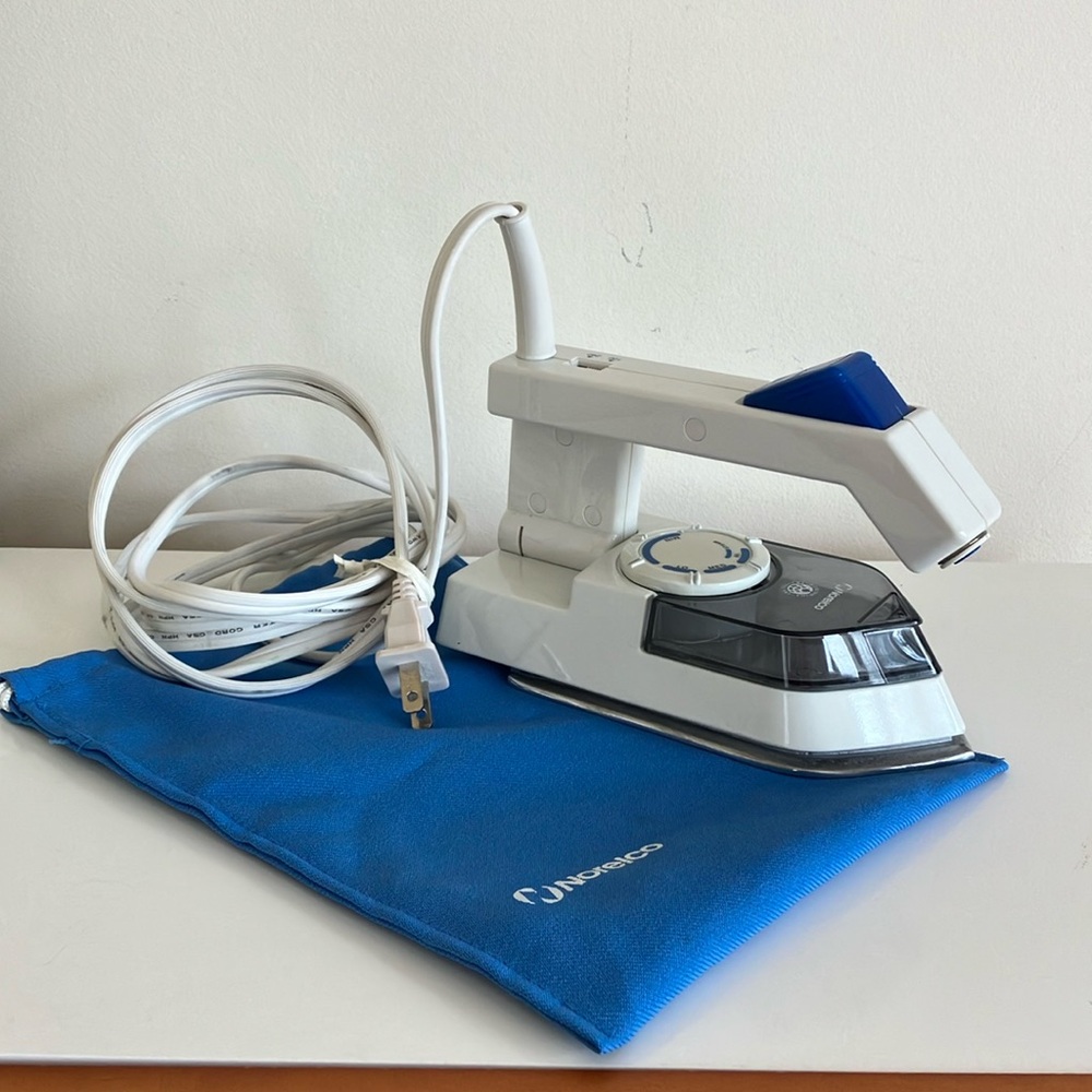 NORELCO White and Blue Travel Iron